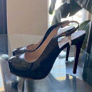 Steve Madden black patent leather pumps.